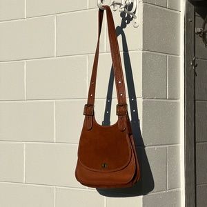 Coach cross-body genuine glove-tanned brown leather.